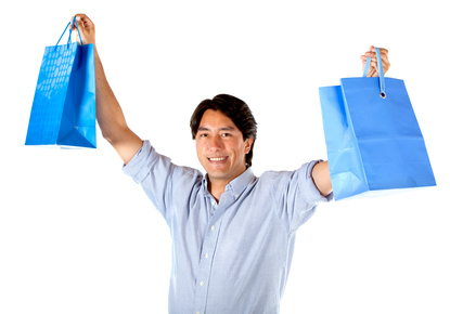 Excited man with shopping bags