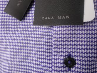 purple and white houndstooth shirt